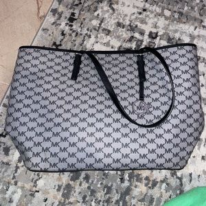 MK bag with matching wristlet worn twice